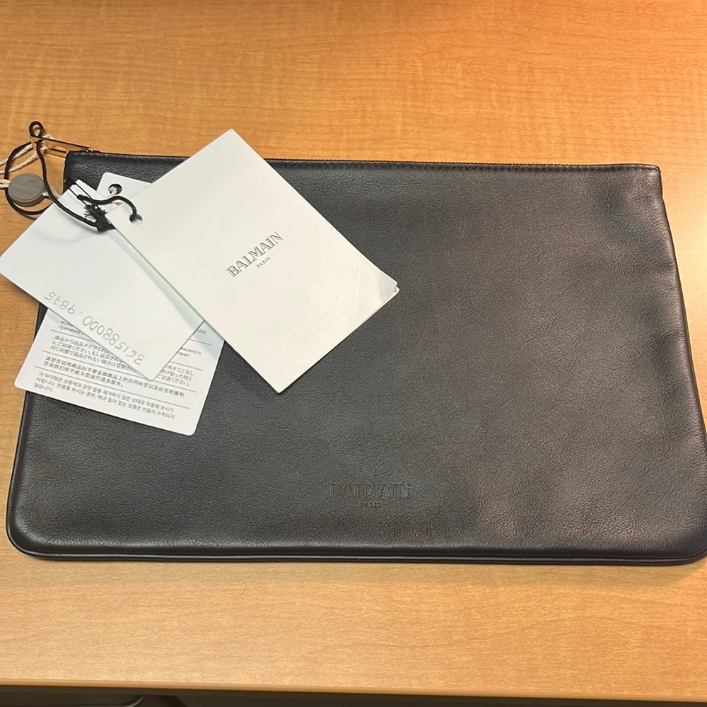 Navy blue Balmain leather clutch brand new with tags.